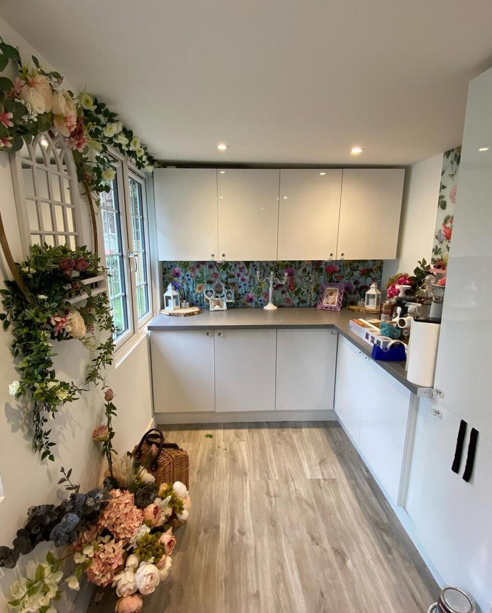 outdoor studios and is used for a beauty room/workroom and kitchenette.